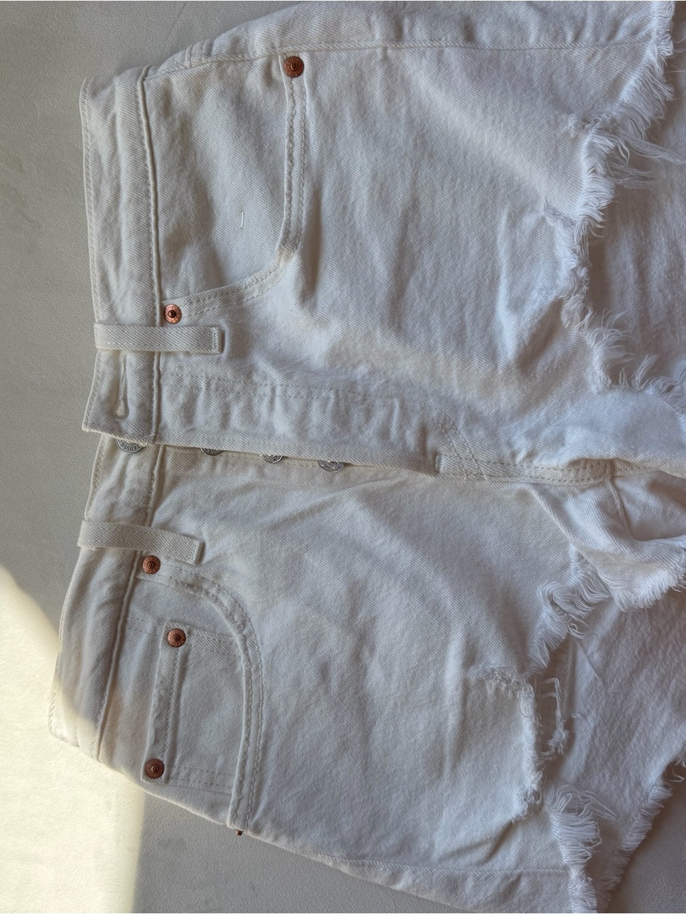 Levi’s 501 white denim cutoff short